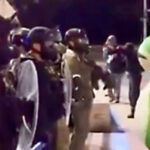 Law enforcement confronted by amphibian